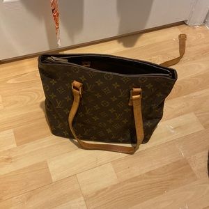 LV Houston bag. Used. Broken strap.